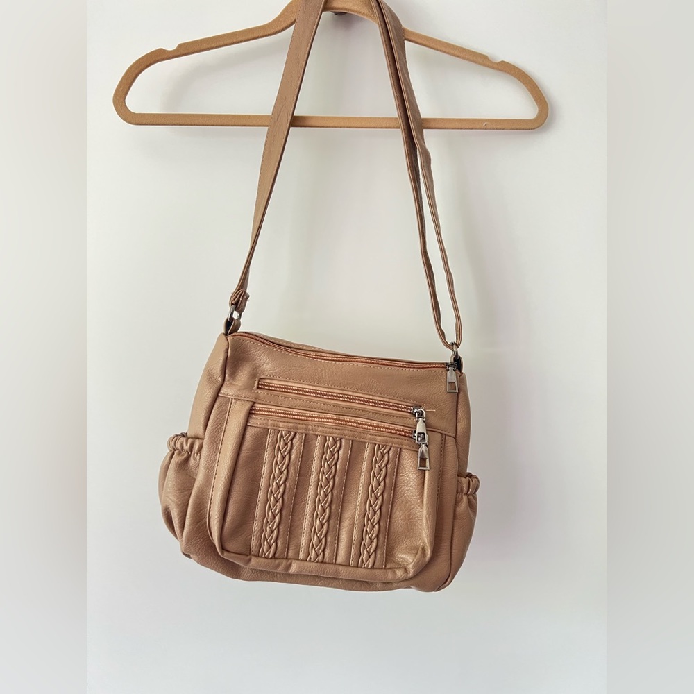 Classic Tan Elda Crossbody Bag with Adjustable Straps and Metal Hardware